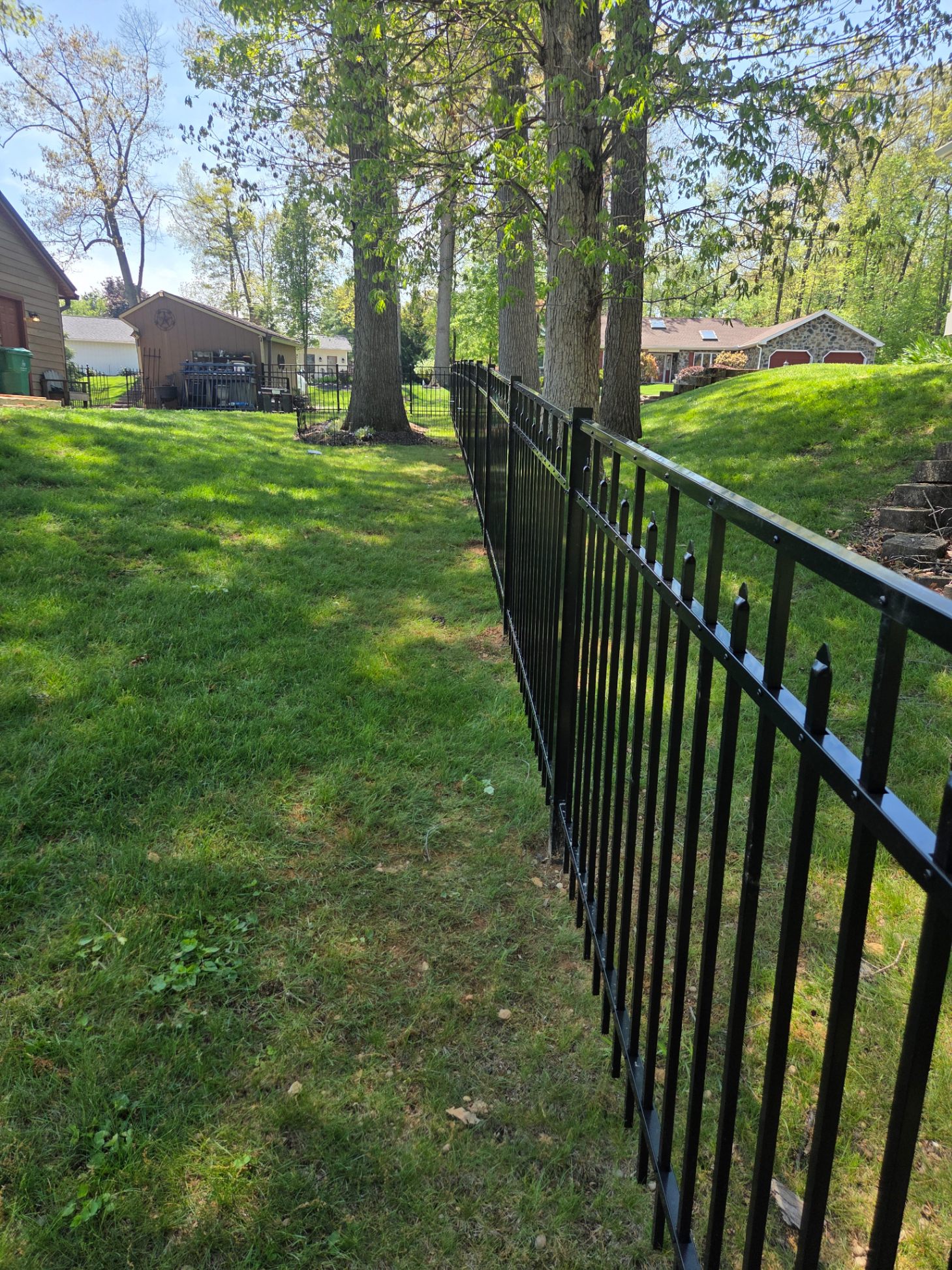 Black aluminum fence on hillside — Franklin County PA