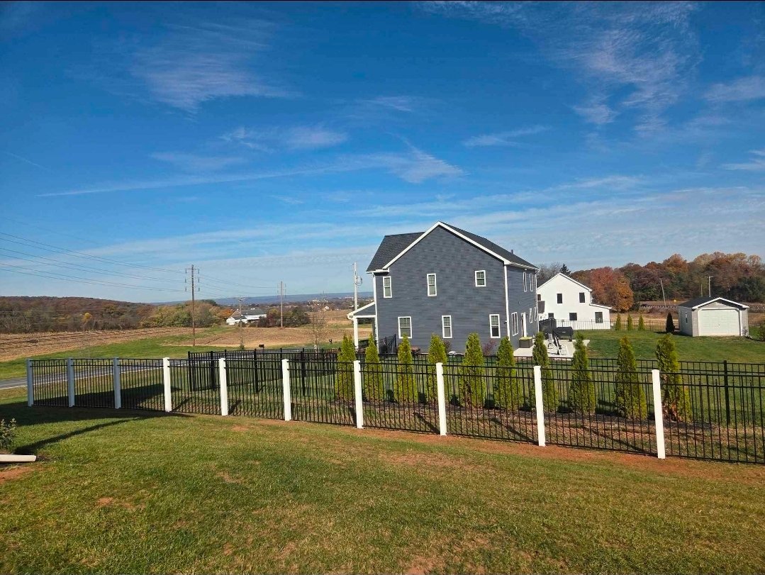 Black and white aluminum fence with white posts — Franklin County PA