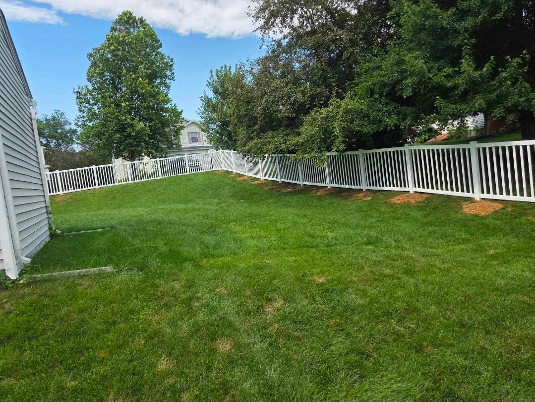 White vinyl picket fence — residential installation PA